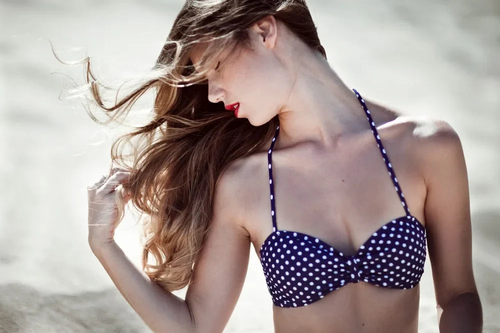 Fashion editorial portrait of Andrea on a cliff edge, photo 1