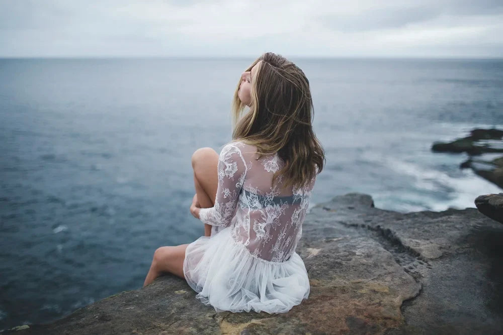 Fashion editorial portrait of model El at the sea, photo 1