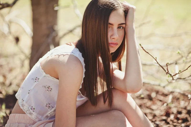 Pastel fashion campaign photo in a grass field, photo 1